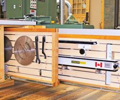 a work bench with tools on it in a factory