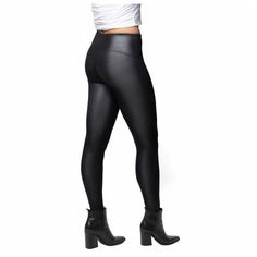 Features: Color: Black Soft Hand Feel Smoothing High Waistband Seamless Front Rise Reinforced Seams Breathable Wicks Moisture Retains Body Warmth Fabric Content: 82% Nylon | 18% Spandex Approximately 158 Gsm Lightweight Sizing: Sizes: S - Xl Size Conversion: S = 2-4 | M = 6-8 | L = 10-12 | Xl = 14-16 Inseam (In): 27" Model Is 5'7.5" Wearing Size Medium Black High Stretch Polyurethane Leather Pants, High Stretch Black Leather Pants, High Stretch Black Faux Leather Leggings, High Waist Black Polyurethane Leggings, High Waist Black Polyurethane Leather Pants, High Waist Black Faux Leather Leggings, Black High-waisted Polyurethane Leather Pants, High-waisted Black Leather Pants, Fitted Faux Leather Black Leggings