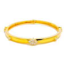 This exquisite 18k gold bangle, weighing 16.4 grams, features a dapper high finish design adorned with dazzling diamonds. The yellow gold finish enhances its luxurious appeal, making it perfect for any special occasion. The bangle is set with 1.1 carats of F-G color, VS quality diamonds in round brilliant cut shapes. With a bangle size of 2.4 and an opening diameter of 2.25 inches, this piece offers both elegance and comfort. Ideal for those who appreciate high-quality craftsmanship and timeless 18k Gold Bangle, Diamond Bangles Bracelet, Vs Diamond, Radiant Diamond, Gold Bangle, Diamond Bangle, Quality Diamonds, 1 Carat, Gold Bangles