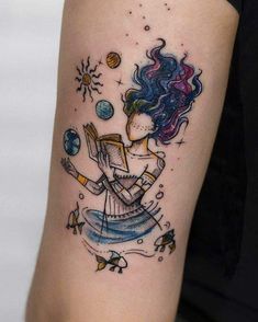 a woman with a book and planets tattoo on her arm is holding an open book