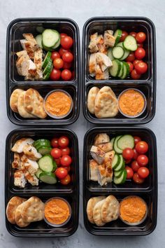 four plastic trays filled with different types of vegetables and chicken on top of each other