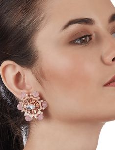 Editor's Note Delicate And Vibrant, The Fluora Eternite Blush Mini Ear Studs Are Brilliance Redefined. Set In 22K Rose Gold Plating, The Intricate White Enamelling Adds Depth And Drama To The Exuberant Floral Patterns, Illustrating Handcrafted Luxury. The Dazzling Jewel Has Used The Finest Crystal Baguettes And Pale Pink Coloured Carved Stones Stone Statements As Accents To Add A Flair Of Modern Femininity. Material: Brass Plating: Rosegold Care: Store your jewelry in a box away from humidity or Studs Gold, Stone Carving, White Enamel, Baroque Pearls, Designer Wear, Brass Color, Ear Studs, Gold Earrings Studs, Aza Fashion