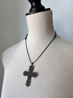 "Gothic cross necklace from Haizea Couture Large cross pendant choker necklace perfect accessory for your steampunk or dark academia costume! This unisex necklace is made of antique gold color cross and adjustable cotton cord. NECKLACE DETAILS ⚬ Handmade in our atelier with lot of care. ⚬ Ready to ship. ⚬ Antique gold color cross. ⚬ Adjustable cotton cord. MORE ACCESSORIES IN OUR SHOP: https://www.etsy.com/shop/HaizeaCouture FOLLOW US Facebook: haizeaarranz Instagram: @haizearranz QUESTIONS? Just use the \"Message Haizea\" button below and we'll be happy to help! Thanks for shopping at Haizea Couture! © 2023 Haizea Arranz. All rights reserved" Gothic Metal Cross Necklaces, Gothic Metal Cross Necklace, Gothic Crucifix Cross Necklace As Gift, Gothic Crucifix Cross Necklace For Gift, Gothic Cross Necklace Gift, Adjustable Gothic Cross Pendant Jewelry, Vintage Adjustable Cross Pendant Necklace, Adjustable Vintage Cross Pendant Necklace, Adjustable Nickel-free Crucifix Necklace