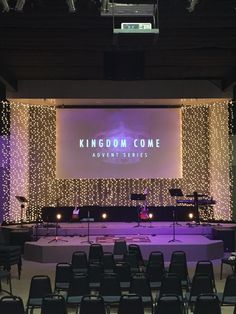 the stage at kingdom come is set up for an event with chairs and lights on it