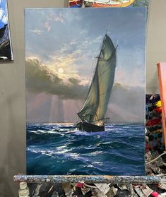 an oil painting of a sailboat in the ocean with sun rays coming through clouds