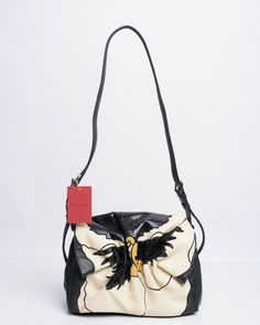 Valentino Bloomy Shoulder Bag Purse Embroidered Leather Medium Black Ivory NWT Estimated Retail Price: $4,245 Condition: new with tags- line through inner brand label to prevent store returns Accessories: Dust Bag Measurements: Height 9", Width 12", Depth 5", Strap Drop 17" Designer: Valentino Model: Bloomy Shoulder Bag Embroidered Leather Medium Exterior Material: Leather Exterior Color: black and off white ivory  Interior Material: Microfiber Hardware Color: Gold Tone ***you must sign for this delivery **** Formal Embroidered Leather Shoulder Bag, Designer Cream Textured Leather Shoulder Bag, Luxury Embroidered Cream Bag, Embroidered Leather Evening Bag, Embroidered Beige Leather Bag, Beige Embroidered Leather Bag, Black Leather Bag With Embroidered Logo, Valentino Shoulder Bag, Black Designer Bags