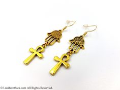 Mini Ankh Earrings - Ankh Symbols (2cmx1.3cm) - Hamsa Symbols. - 4cm total earrings length. - Earhooks in various material : Chose from dropdown box. - Gold colour. - Handmade. - Comes in a pair. Fast Worldwide Shipping More jewellery, accesoires, altar equipment and much more can be found at www.luciferothica.com © Luciferothica.com All Rights Reserved. Ankh-shaped Metal Earrings For Gift, Nickel Free Ankh Earrings For Gift, Ankh Shaped Metal Earrings For Gift, Symbolic Gold Plug Earrings As Gifts, Nickel-free Ankh Earrings As Gift, Symbolic Gold Plug Earrings For Gift, Nickel-free Ankh Gold Earrings, Handmade Gothic Gold Earrings, Adjustable Gold Jewelry For Halloween