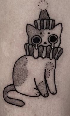 a black and white tattoo with a cat wearing a hat on it's head