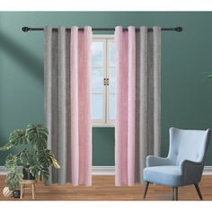 pink and grey curtains hanging in front of a window with a blue chair next to it