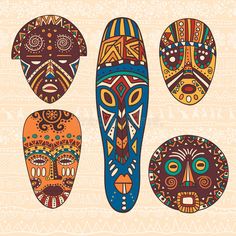 three african masks with different designs on them