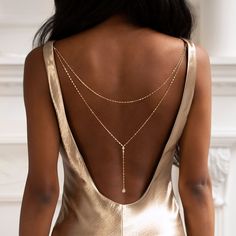 Sapphire Back Drop Necklace, Dress Neckline Guide Jewelry, Luxury Elegant Long Drop Backdrop Necklace, Luxury Minimalist Backdrop Necklace With Adjustable Chain, Luxury Long Drop Backdrop Necklace For Formal Occasions, Luxury Formal Backdrop Necklace For Women, Luxury Crystal Elegant Backdrop Necklace, Vintage Back Jewelry, Luxury Elegant Crystal Backdrop Necklace