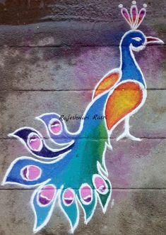 a colorful peacock painted on the side of a building