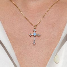 Now trending! Our Serendipity Cross Necklace is a fun twist on a classic design with a dazzling blue gem accent, adding just the right bit of color to your look. A perfect way to show off your unique style! Gem Cross Necklace, Gold Cross Necklace, Christian Jewelry, Blue Gems, Rose Gold Necklace, Show Off, 18k Rose Gold, Rose Gold Plates, Sale Items