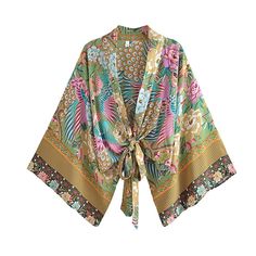 Our beautiful Metella Boho Kimono has a bold and vibrant floral with peacocks print design. Made from a lightweight cotton blend that will look great both as a summer layer or on the beach. Kimono Shirts Women, Kimono Print, Kimono Wrap Top, Top Kimono, Kimono Floral, Boho Mode, Floral Print Kimono, Boho Festival Fashion, Kimono Wrap