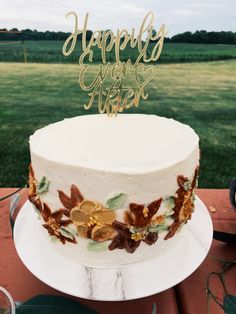 a white cake sitting on top of a table