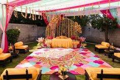 a decorated lawn area with yellow and pink decor