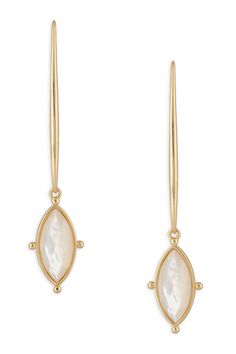 Ships Free + Happiness Guarantee The Lauren Earrings were inspired by a hand-made pair of earrings Ashley created for her sister over a decade ago. The beloved "Lauren" earrings feature gorgeous faceted Mother of Pearl stones with unique and delicate gold details. These statement earrings are super light and can be worn from morning to night and everything in between. 18K gold-dipped finish size: 2.65"L ivory Mother of Pearl stones super light for all-day wear Dainty Gold Marquise Earrings, White Dangle Earrings With Faceted Details, Gold Marquise Pierced Earrings, White Faceted Dangle Earrings, Elegant Faceted Brass Earrings, Timeless White Drop Earrings, Delicate Faceted Gold Earrings, Timeless White Linear Drop Earrings, Gold Marquise Earrings