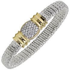 This beautiful 8mm sterling silver and 14k yellow gold bracelet by Alwand Vahan packs a punch with .53ctw of diamonds! You will dazzle everyone that walks by! Vahan Jewelry, Pave Bracelet, Designer Diamond Jewellery, Magazine Article, Mixed Metal Jewelry, Elegant Bracelet, Designer Fashion Jewelry, Yellow Gold Bracelet, Choice Awards