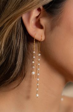 Simplicity! These the fresh water pearl earrings make a fashionable statement. The long and sexy look is striking. Long Drop Earrings Gold, Dangle Linear Earrings With Pearl Charm For Party, Long Drop Pearl Earrings For Pierced Ears, Pearl Charm Dangle Linear Earrings For Party, Party Pearl Chain Dangle Earrings, Party Pearl Chain Drop Earrings, Long Drop Pearl Chandelier Earrings For Party, Elegant Pearl Drop Long Drop Chandelier Earrings For Parties, Elegant Long Drop Pearl Chandelier Earrings For Parties