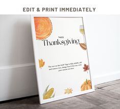 there is a sign that says happy thanksgiving on the floor next to a white wall