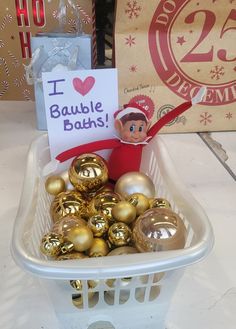 This is a elf on the shelf idea. The elf is sat in a little tub filled with baubles. The north poles version of a Bubble bath... A bauble bath! Elf On The Shelf Bath, Christmas Elfs, Bubble Bath, North Pole, On The Shelf