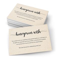 two business cards with the words honeymoon wish written in black ink on them, sitting next to each other