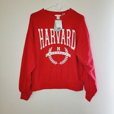 H&M Harvard Sweatshirt Crew Neck Red Xs Oversize Pullover Ivy League Classic H&M Size Xs Dropped Shoulders Long Sleeves Ribbing At Neckline, Cuffs, And Hem. Soft, Brushed Inside Regular Length Sleeve Length: Long Sleeve Loose Fit Sweatshirt Crew-Neck Bright Red/White, Harvard University, Harvard University Cotton 80%, Polyester 20% 15% Recycled Polyester 15% Recycled Cotton Smoke Free Pet Free Home Please See The Pictures For Measurements Thanks H&m Long Sleeve Sweatshirt With Ribbed Cuffs, Oversized Red Sweater With Letter Print, University Red Collegiate Top For Fall, Collegiate University Red Tops For Fall, Red Varsity Sweatshirt With Graphic Print, H&m Oversized Cotton Sweatshirt, Red Varsity Top With Ribbed Cuffs, Trendy Oversized Red Sweatshirt, H&m Oversized Winter Sweatshirt