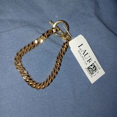 Lauren Ralph Lauren Gold Bracelet 7" * New With Tags * Prices Are Negotiable. * No Reasonable Offers Refused. * Leave Questions Or Comments Below. * Thank You For Visiting My Closet. 1410 Ralph Lauren Jewelry, Lauren Ralph Lauren, Womens Jewelry Bracelets, Polo Ralph, Gold Bracelet, Polo Ralph Lauren, Ralph Lauren, Size 7, Thank You