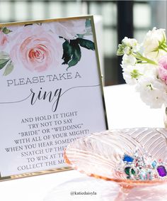 there is a sign that says please take a ring and hold it tight, bride or wedding jewelry