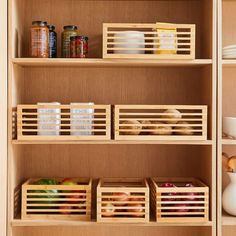 the shelves are filled with food and containers