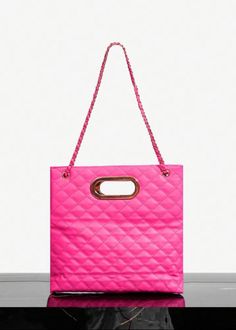 Expertly crafted with eco-friendly leather, this Rhombic Grid Convertible Bag seamlessly transforms from a functional shopper bag to a chic evening clutch. Its vibrant hot pink hue adds a pop of color to any outfit, while the chain-embellished shoulder strap provides a touch of glamour. Effortlessly switch between styles for any occasion. Material: Polyurethane Modern Pink Shoulder Bag With Chain Strap, Chic Pink Bag With Chain Strap, Chic Shopping Bags With Chain Strap, Chic Shopping Bag With Chain Strap, Versatile Pink Shoulder Bag For Shopping, Pink Shopping Bag With Chain Strap, Chic Pink Shoulder Bag For Shopping, Pink Clutch Shoulder Bag For Shopping, Modern Pink Party Bags