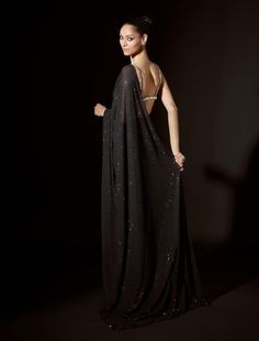 Black crystal-embellished pre-stitched sari paired with a silver blouse featuring striking big stones. Silver Blouse, Drape Saree, Black Saree, Indian Dress, Blouse For Women, Stone Work, Wedding Outfits, Saree With Blouse, Black Crystals