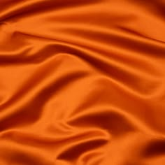 an orange fabric with very thin folds