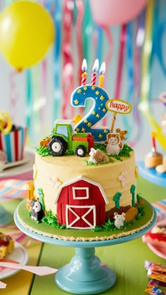 a birthday cake is decorated with farm animals