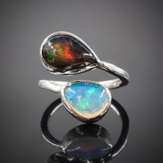 Black and white multi fire Ethiopian opal ring for women, vintage fire opal jewelry, AAA Ethiopian opal ring, Natural fire opal ring, October birthstone, Rare fire opal ring. ✪Detail. ▶◀Gemstone - Ethiopian Opal  ▶◀Stone Color - Natural Black, White  ▶◀Birthstone - October Birthstone  ▶◀Stone Type - 100% Natural  ▶◀Fire - Multi Fire  ▶◀Quality - AAA Grade Quality  ▶◀Crt Weight - 15.45 Crt  ▶◀Gem Origin - Ethiopian Welo  ▶◀Shipping Service - Free World Wide Shipping Service  O T H E R ∙ I N F O R Opal Art, Fire Opals Jewelry, Jewelry Real, Ethiopian Opal Ring, Fire Opal Ring, Deco Jewelry, Opal Stone, October Birthstone, Opal Ring