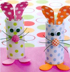 two toilet paper roll rabbits with polka dots on them