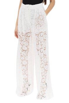 Dolce&Gabbana pajama-inspired pants crafted in viscose and cotton-blend cordonnet lace, characterized by a wide relaxed cut enhanced by front pleats. They feature zipper-fly and logoed cannet??-button closure, side slash pockets and scalloped hem. The model is 177 cm tall and wears size IT 42. Lace Pants, Active Wear Pants, Dolce E Gabbana, Scalloped Hem, Emilio Pucci, Denim Pant, Dolce & Gabbana, Women Lace, Costume Design