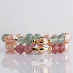 Genuine AAA Grade Strawberry Quartz stretch bracelet. Crystals and Gemstones are each unique and beautiful in pattern, please be aware that our images are for information purposes only, as a natural product their appearance and color may vary from the images shown. Please note the stone shade, color, and pattern may vary since we are working with genuine stones no two are alike. Strawberry Quartz is an amazing stone that has the ability to bring energies of universal love into your life so that Elegant Pink Stretch Bracelet With Natural Stones, Elegant Stretch Bracelet With Natural Stones Bangle, Elegant Stretch Bangle Bracelet With Natural Stones, Elegant Gold Stretch Bracelet With Natural Stones, Sunstone Jewelry, Bracelet Crystal, Moonstone Bracelet, Wish Bracelets, Strawberry Quartz