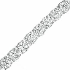 A timeless style, this tennis bracelet is a look you'll want to wear with everything. Fashioned in sterling silver, this design showcases a row of 6.0mm shimmering white lab-created sapphires. Polished to a bright shine, this 7.25-inch bracelet secures with a box clasp. Sapphire Tennis Bracelet, White Lab, Box Clasp, Sapphire Stone, Bracelet Clasps, Gemstone Bracelets, Tennis Bracelet, Showcase Design, Bracelet Designs