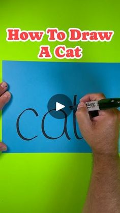 two hands writing on a piece of paper with the words how to draw a cat