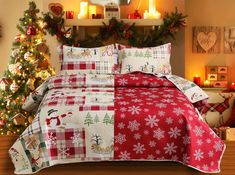 a christmas themed bed with red and white sheets