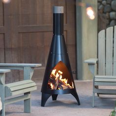 a fire pit sitting in the middle of a patio