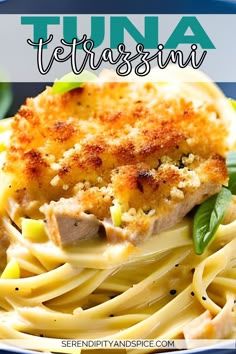 tuna fettuccine with parmesan cheese on top