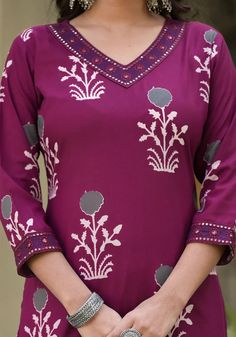 Grab this beautiful 3-piece set. The set comes with straight cut printed kurta has v neck, 3/4th sleeves & calf length teamed with printed trouser pants and a chanderi cotton dupatta to match. Color - Burgandy Kurta Fabric-Viscose Pant Fabric-Viscose Dupatta Fabric- Chanderi Cotton Neck-V Neck Sleeves-3/4th Sleeves Work - Print Detailing Washing Instructions-Dry Clean Model Height - 5.5 wearing size small. DISCLAIMER - The color of the product may be differ due to screen settings of device. A mi Fitted V-neck Kurta For Diwali, Bollywood Style V-neck Kurta With Printed Motifs, Festive V-neck Palazzo Set With Printed Motifs, V-neck Floral Print Kurta For Eid, Bollywood Style V-neck Sets With Printed Motifs, Bollywood V-neck Sets With Printed Motifs, Fitted V-neck Printed Sets, Traditional V-neck Salwar Kameez With Printed Motifs, Eid V-neck Palazzo Set With Printed Motifs