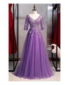 Shop purple long tulle vneck prom dress with appliques sleeves online. All instock with free shipping. Pro since 2009. Purple Princess Dress Kids, Princess Halloween Ideas, Bridesmaids Gowns With Sleeves, Purple Princess Dress, Disney Princess Halloween, Bridgerton Ball, Black Formal Gown, Purple Long Sleeve Dress, Princess Halloween