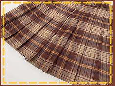 Channel the playful and stylish spirit of Anya from "Spy x Family" with our exclusive plaid pleated skirt. Perfect for fans of the series and fashion enthusiasts alike, this skirt boasts a classic plaid pattern that exudes timeless charm. The pleated hemline offers a sophisticated flair, making it a versatile piece that can be dressed up or down. Whether you're heading to a cosplay event or simply want to incorporate a hint of anime-inspired fashion into your everyday wardrobe, this skirt is a m Plaid Pleated Mini Skirt School Uniform, Pleated Plaid Mini Skirt For School, Plaid Pleated Skirt For School In Fall, Preppy Pleated Plaid Tennis Skirt, Anya From Spy X Family, Spy Family Anya, Brown Plaid Skirt, Blue Pleated Skirt, Steampunk Fashion Male