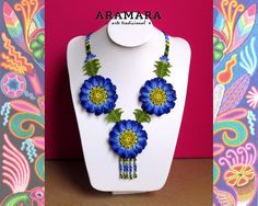 Huichol necklace, Flower necklace, Beaded Flower, Native american necklace, Mexican Necklace, Huicho Blue Beaded Necklace With Flower Pendant, Blue Flower Pendant Beaded Necklace, Handmade Flower Shaped Necklaces, Mexican Necklace, Jewelry Mexican, Mexican Paintings, Beaded Hair Clips, Native American Necklace, Huichol Art