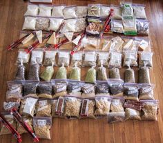 many bags of food are laid out on the floor