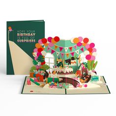 a pop up birthday card with an open book