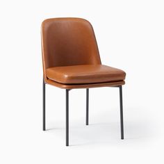 a brown leather chair with metal legs